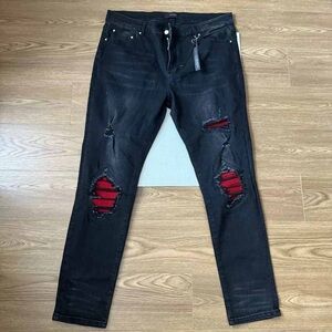 Amiri Washed Ripped Patchwork Black Jeans